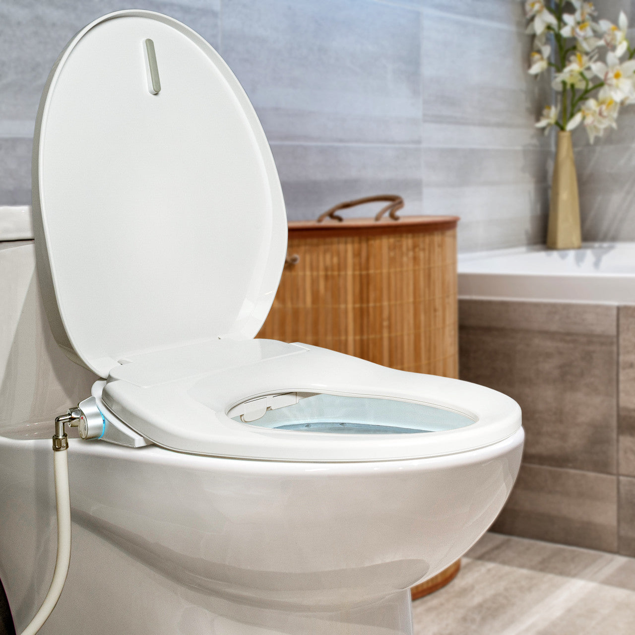 BidetMate 700 Series electric bidet seat — shown installed in a modern bathroom