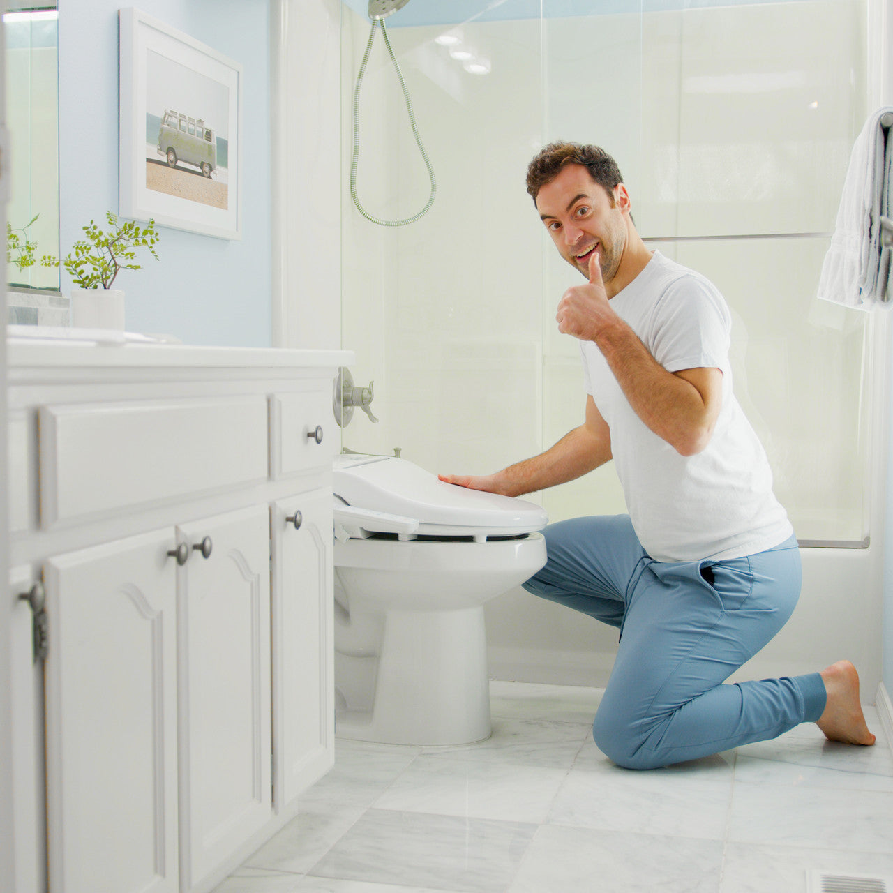 BidetMate 1000 Series electric bidet seat — shown installed in a modern bathroom