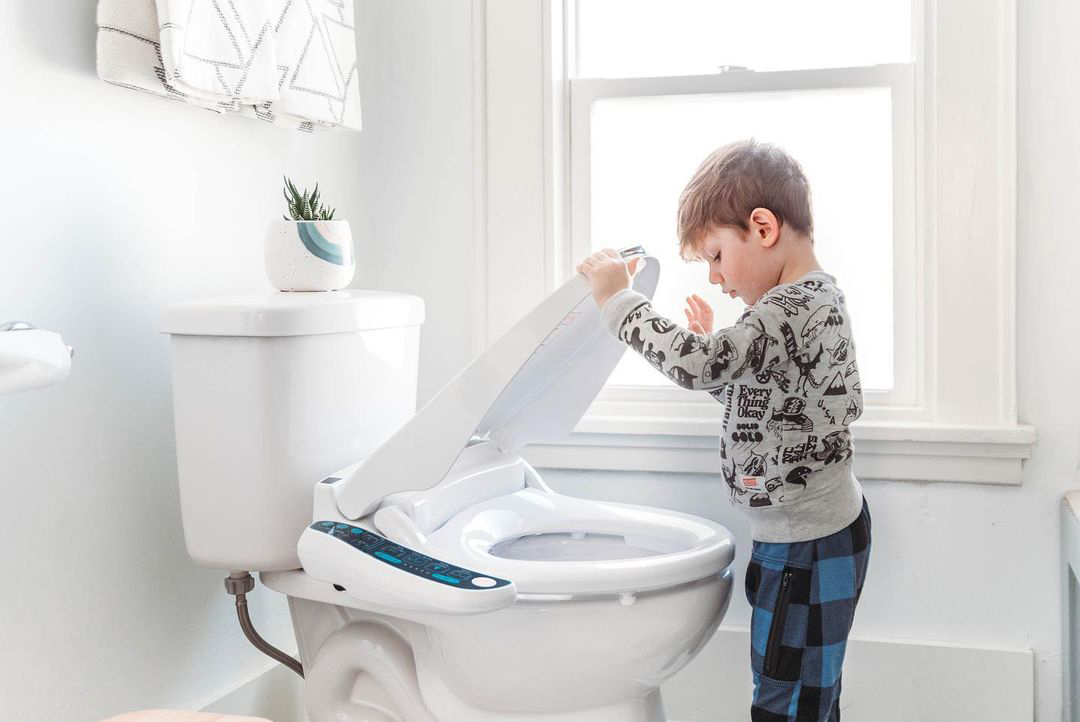 Baby using washrom